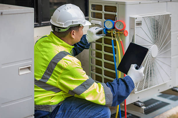 Professional Heat Pump Repair technician working in Montgomery, IN